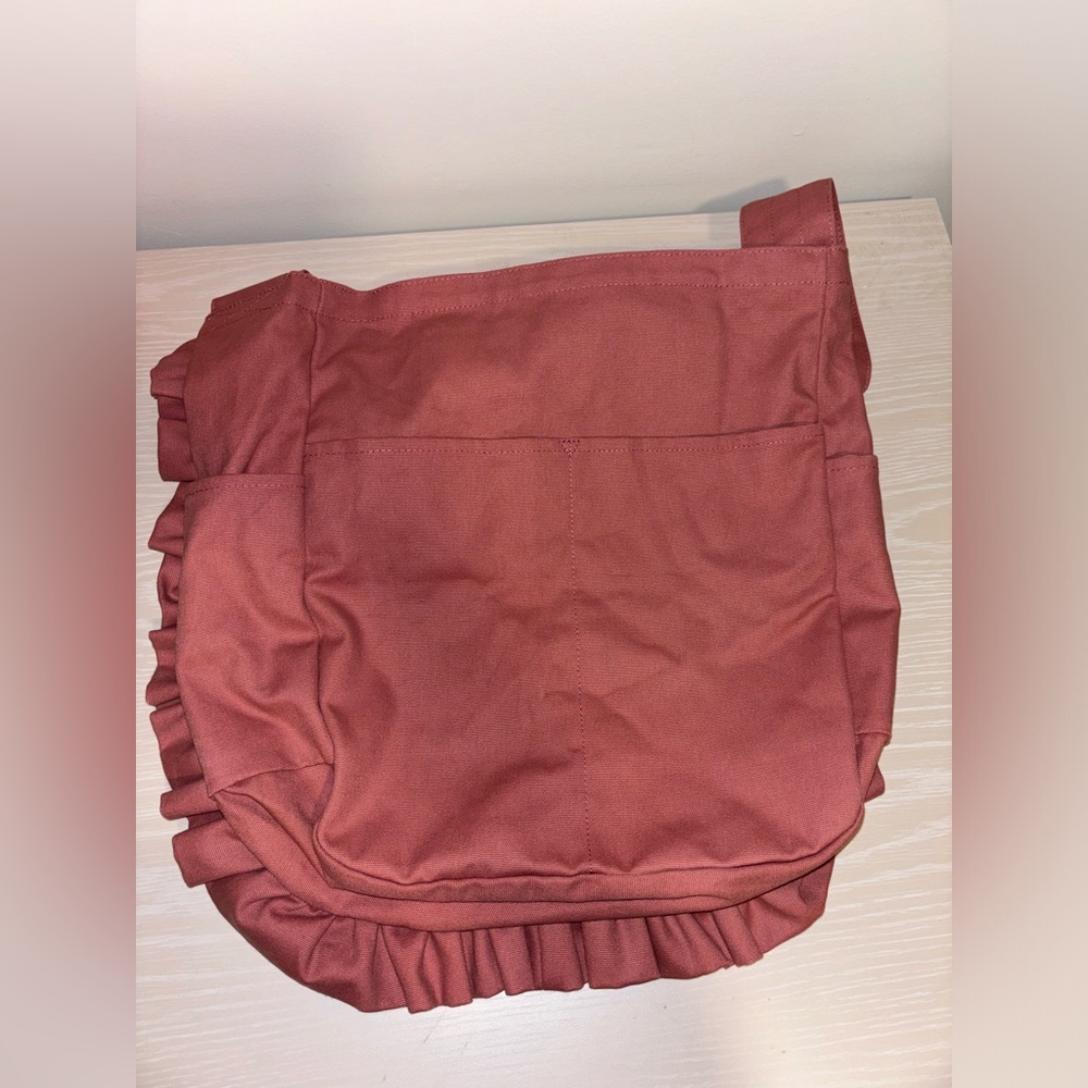 Milk fed shoulder bag with red hearts